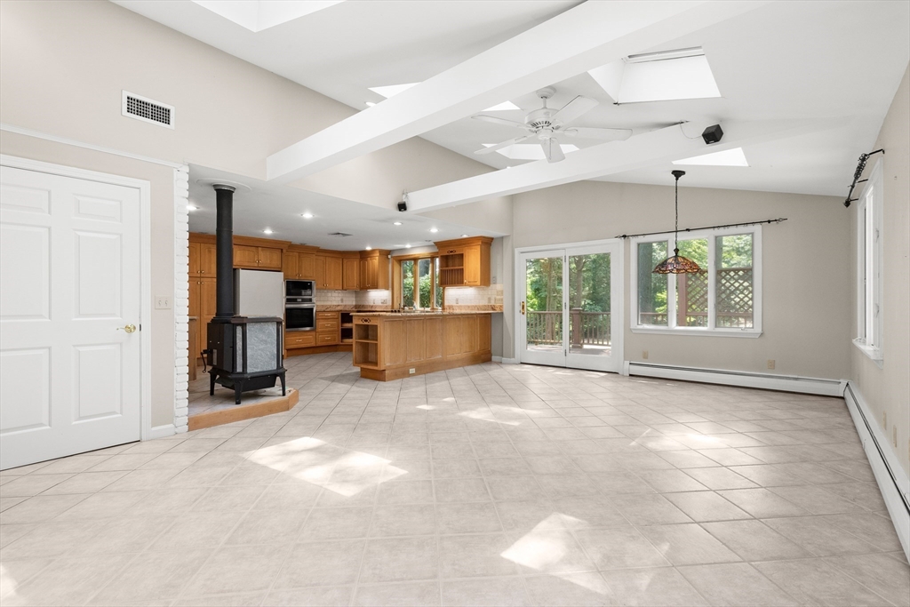 118 Echo Cove Road Hamilton, MA 01982 - Photo 9 of 40 a view of a kitchen with furniture and a window