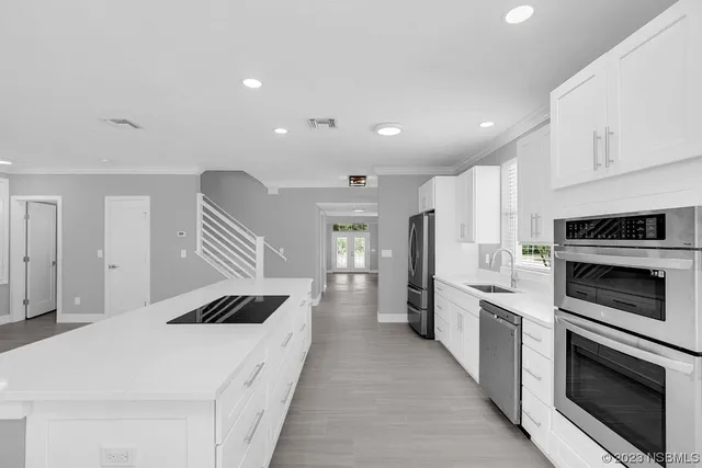 a bathroom with a sink a vanity and mirror