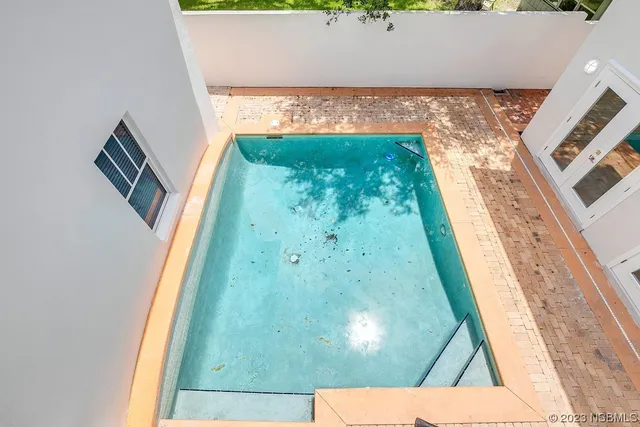 a bathroom with a sink toilet and a mirror