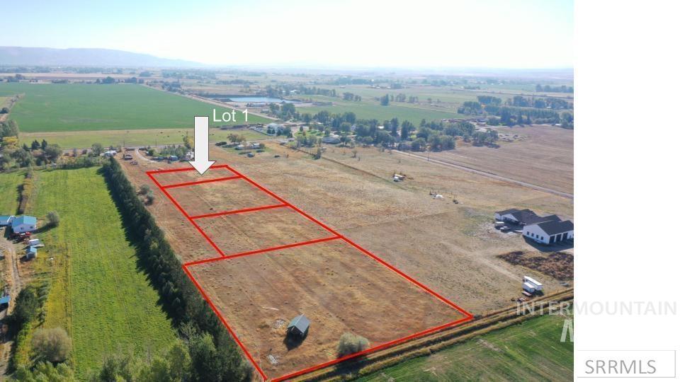 Tbd Lot 1 Tbd Rigby, ID 83442 - Photo 1 of 9 Aerial view of sparsely populated area with property boundaries highlighted