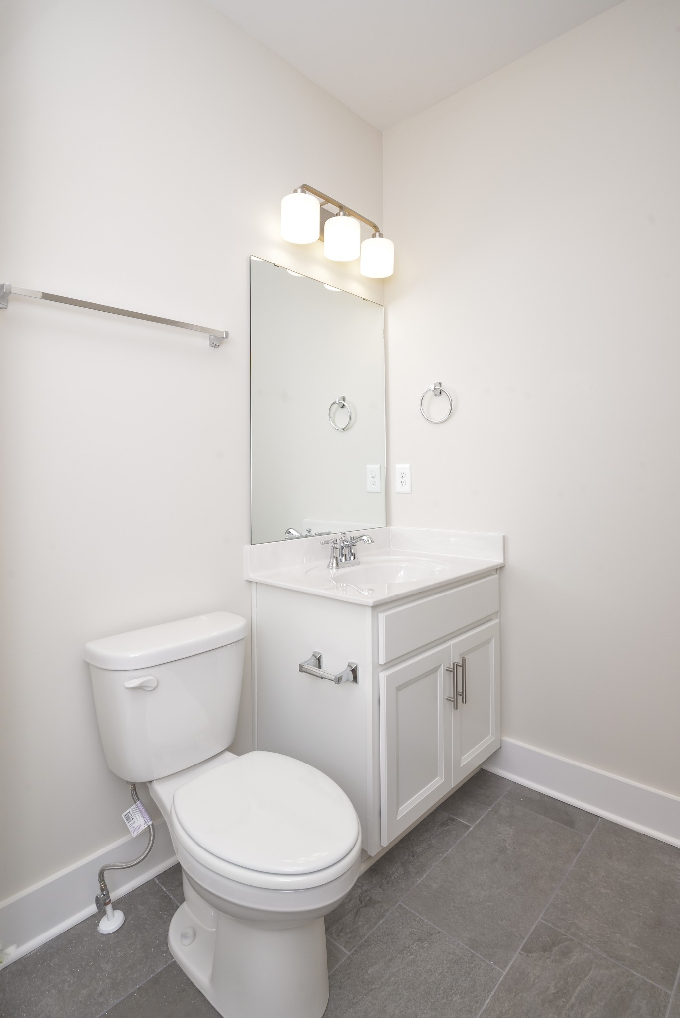 79 Remington Road Lebanon, TN 37090 - Photo 21 of 38 a bathroom with a sink a toilet and mirror