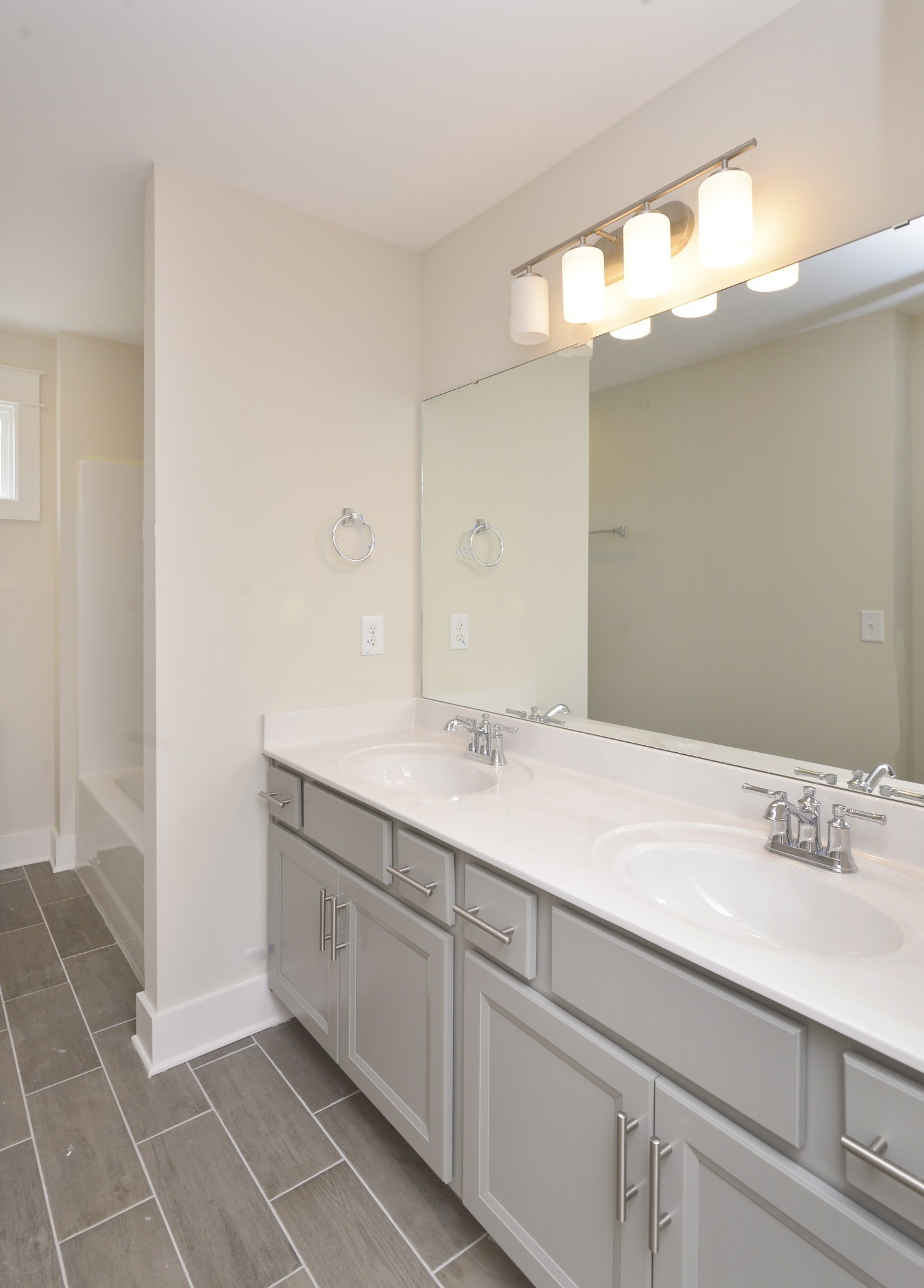 79 Remington Road Lebanon, TN 37090 - Photo 36 of 38 a bathroom with a sink a vanity and a mirror