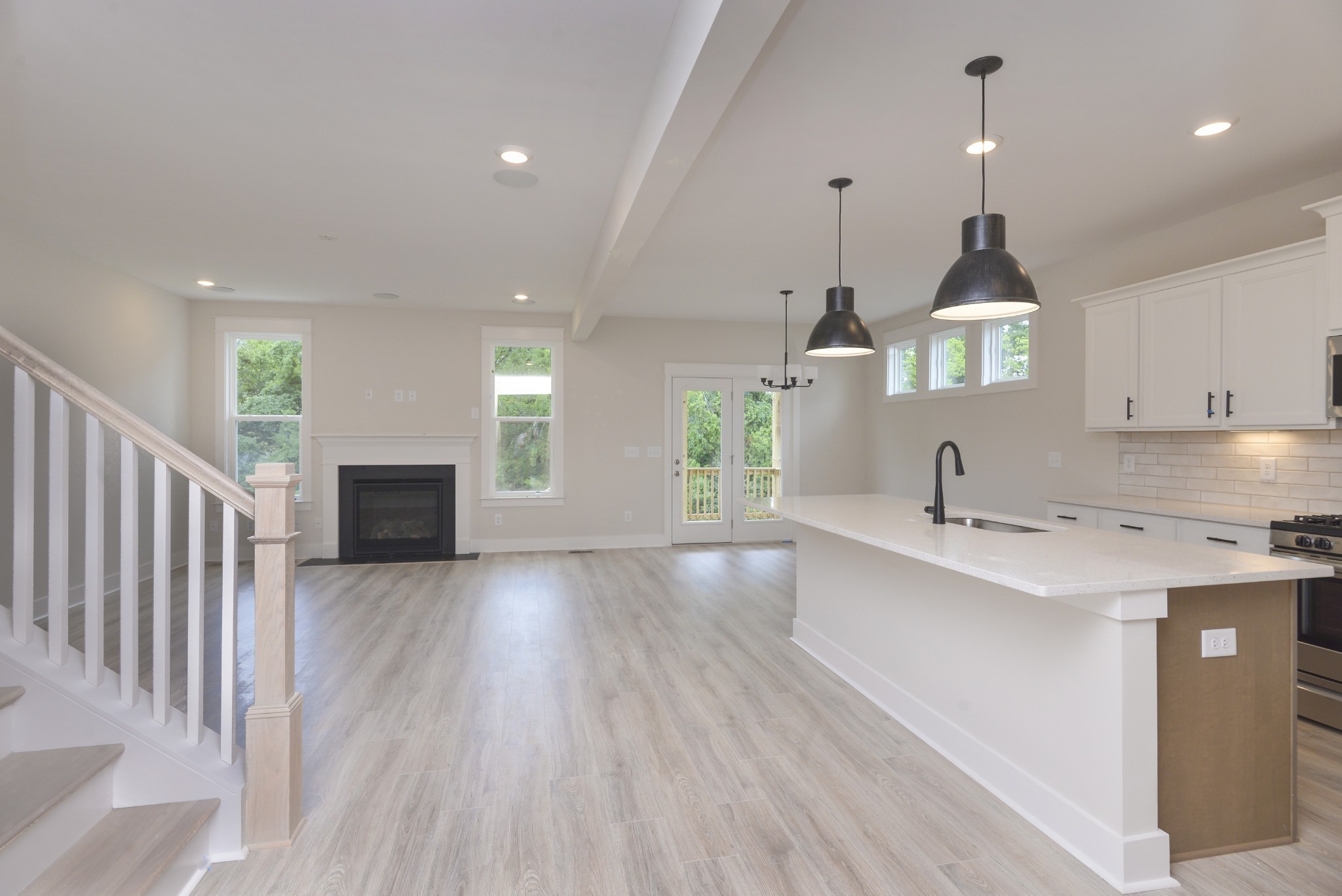 79 Remington Road Lebanon, TN 37090 - Photo 5 of 38 a kitchen with sink microwave and stove
