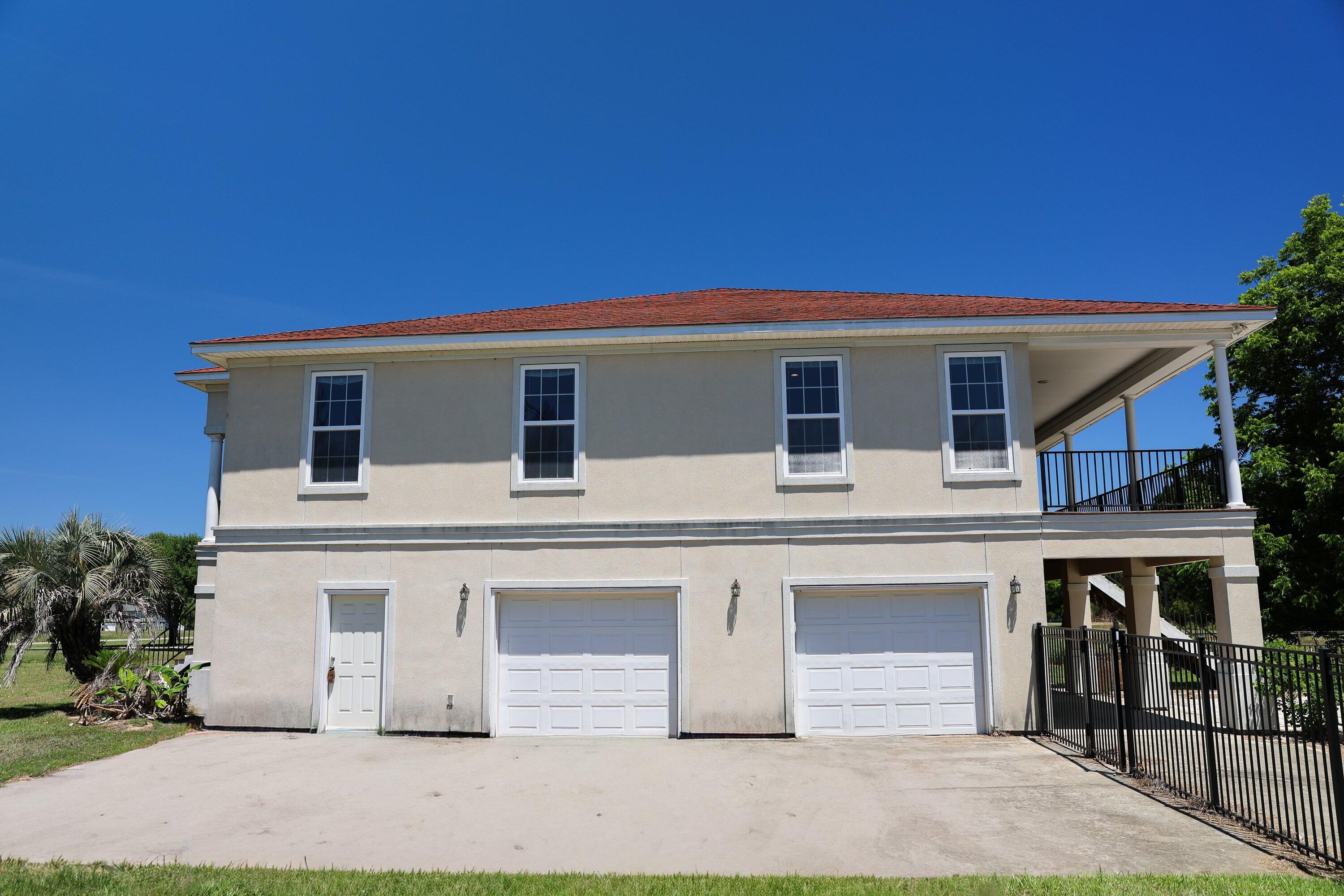 4712 Westervelt Road Meggett, SC 29449 - Photo 31 of 34 01_exterior-front_3G4A8451