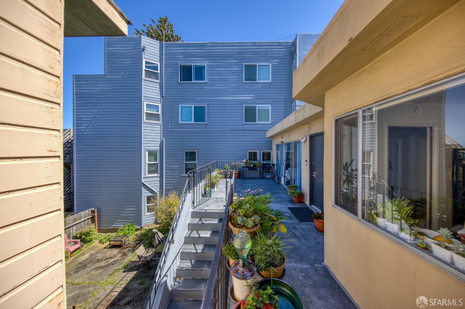 40 Irving Street San Francisco, CA 94122 - Photo 11 of 13 a view of a house with potted plants