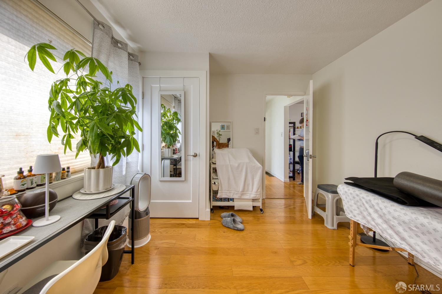 40 Irving Street San Francisco, CA 94122 - Photo 4 of 13 a view of a room with gym equipment