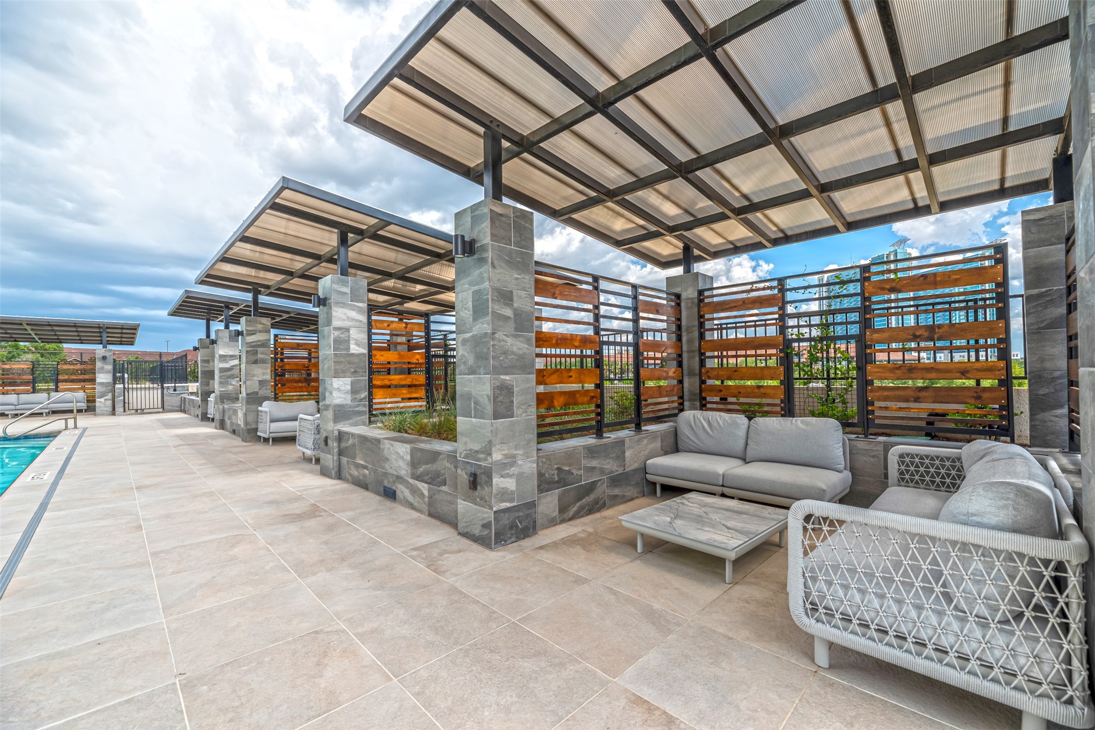 1701 Hermann Drive, Unit 34L Houston, TX 77004 - Photo 29 of 37 The very private design is cleverly interlaced with green spaces and trellises to bring a bucolic feeling to the outdoor experience.