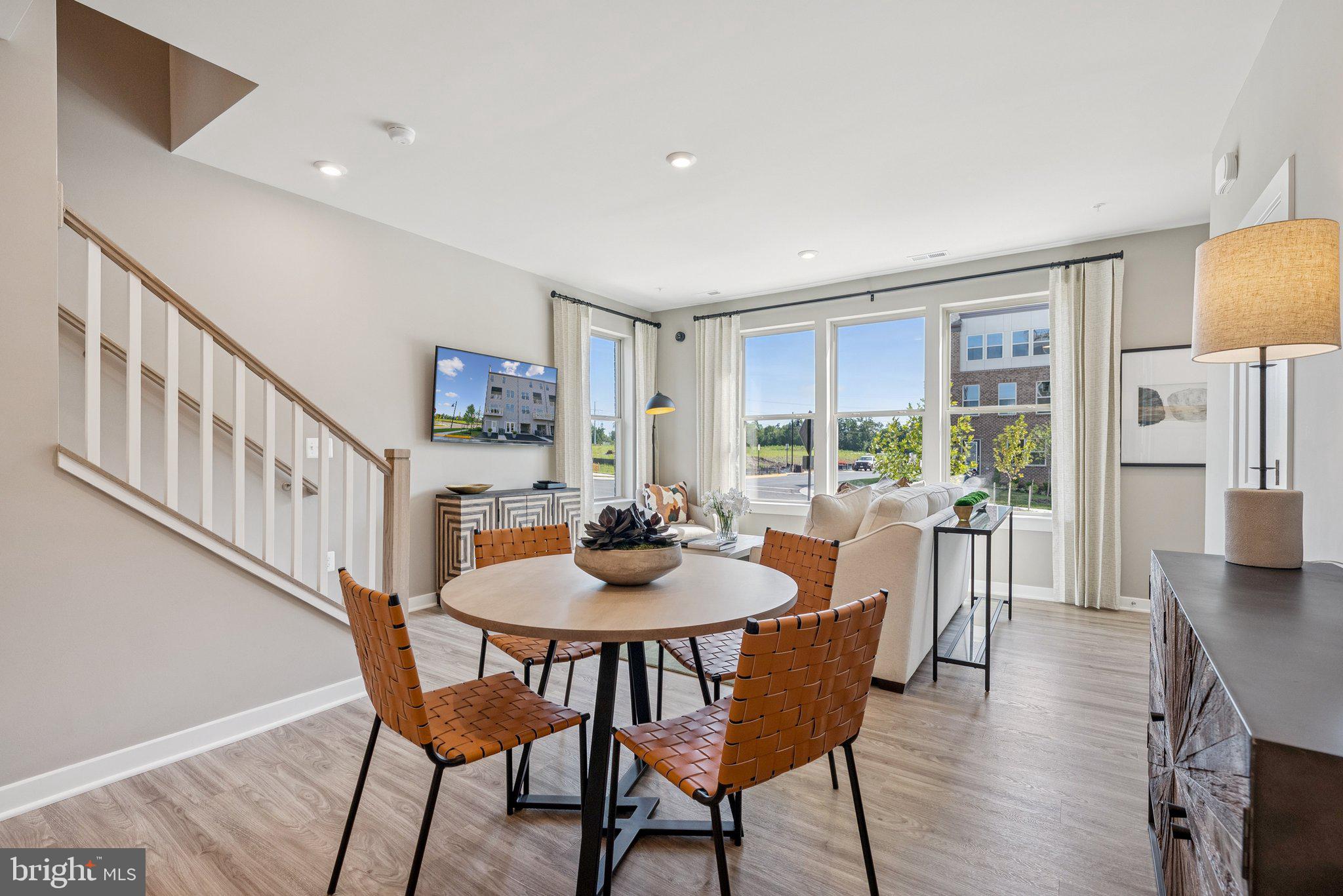 6715 Belcrest Road Hyattsville, MD 20782 - Photo 9 of 28 a view of a dining room with furniture window and wooden floor