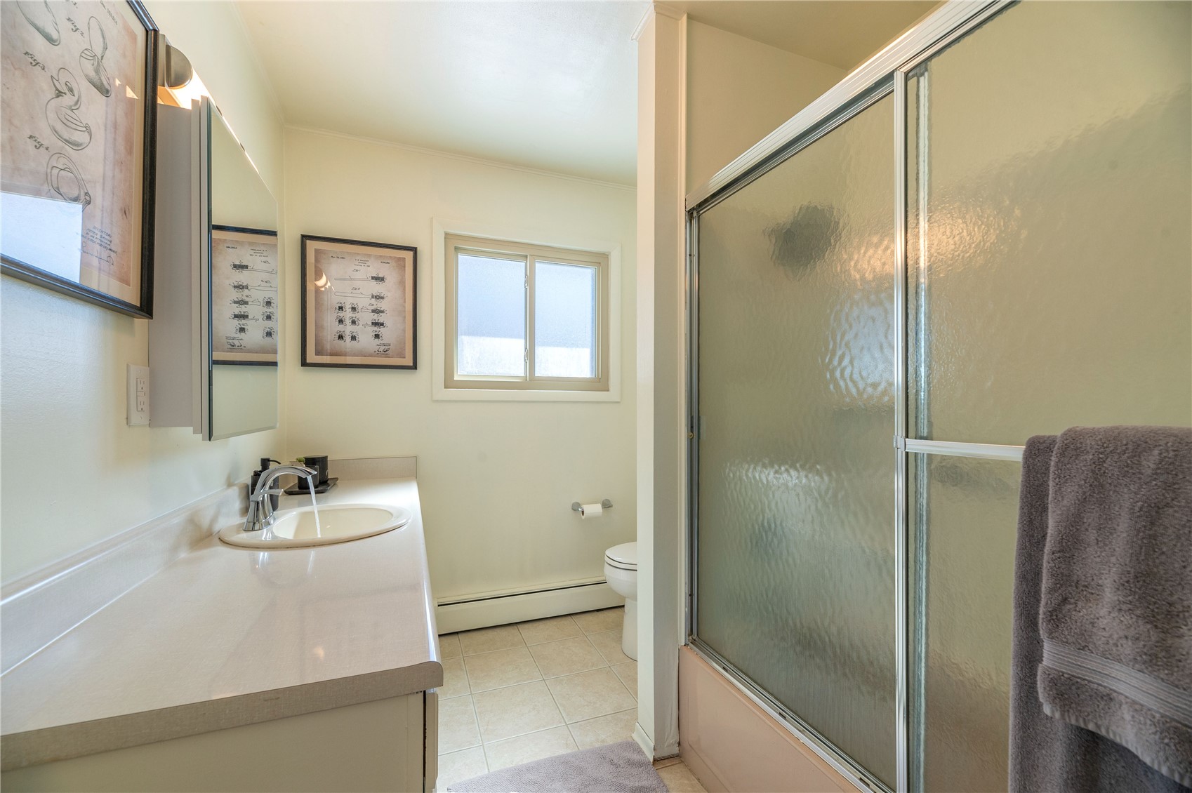 340 Buffalo Street Dillon, CO 80435 - Photo 21 of 40 a bathroom with a sink mirror and shower
