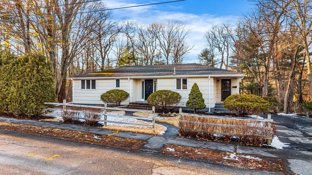 7 Pinewood Road Peabody, MA 01960 - Photo 1 of 11 a front view of house with yard outdoor seating and barbeque oven