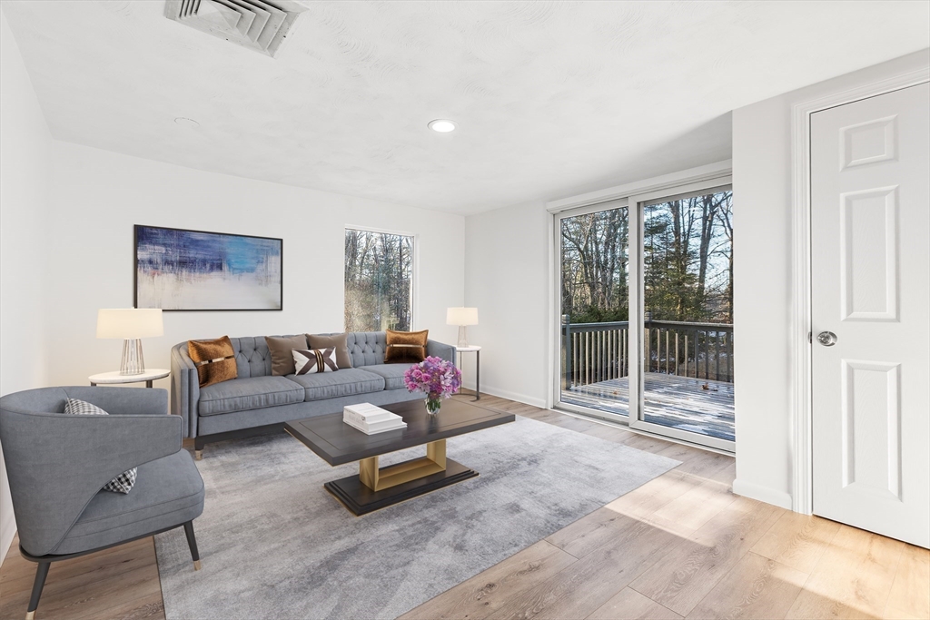 7 Pinewood Road Peabody, MA 01960 - Photo 6 of 11 a living room with furniture and a large window