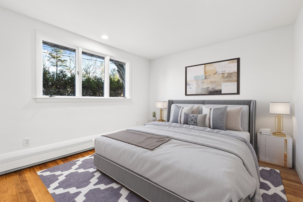 7 Pinewood Road Peabody, MA 01960 - Photo 10 of 11 a bedroom with a bed and a window