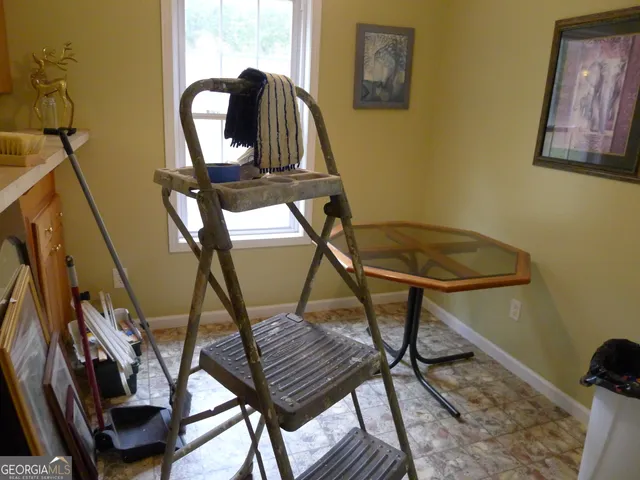 a view of balcony and wooden floor