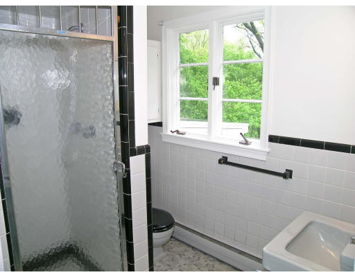 75 Wolcott Road Brookline, MA 02467 - Photo 14 of 16 a bathroom with a window and a shower
