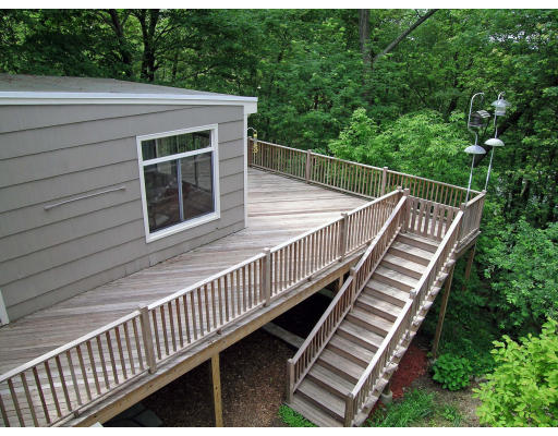 75 Wolcott Road Brookline, MA 02467 - Photo 16 of 16 a view of a balcony with wooden floor