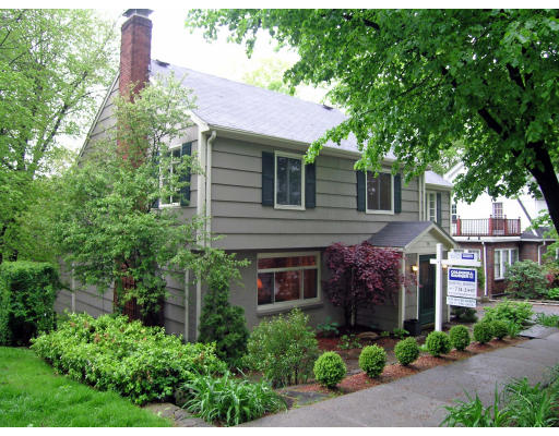 75 Wolcott Road Brookline, MA 02467 - Photo 2 of 16 a front view of a house with a yard and tree