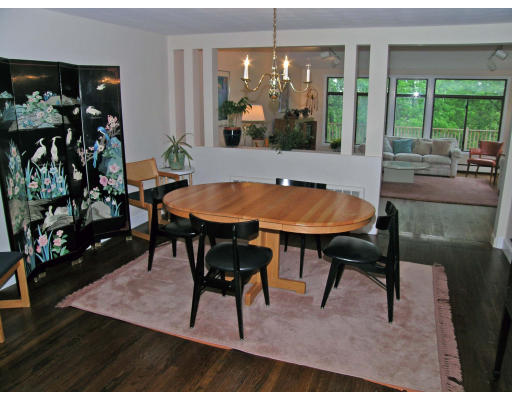 75 Wolcott Road Brookline, MA 02467 - Photo 6 of 16 a view of a dining room with furniture window and outside view