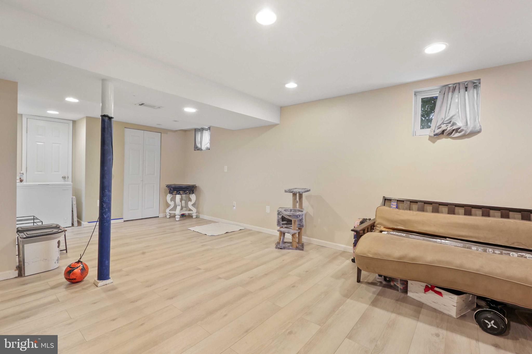 215 Cherrydell Road Catonsville, MD 21228 - Photo 17 of 20 a very nice looking room with a large mirror and a couch