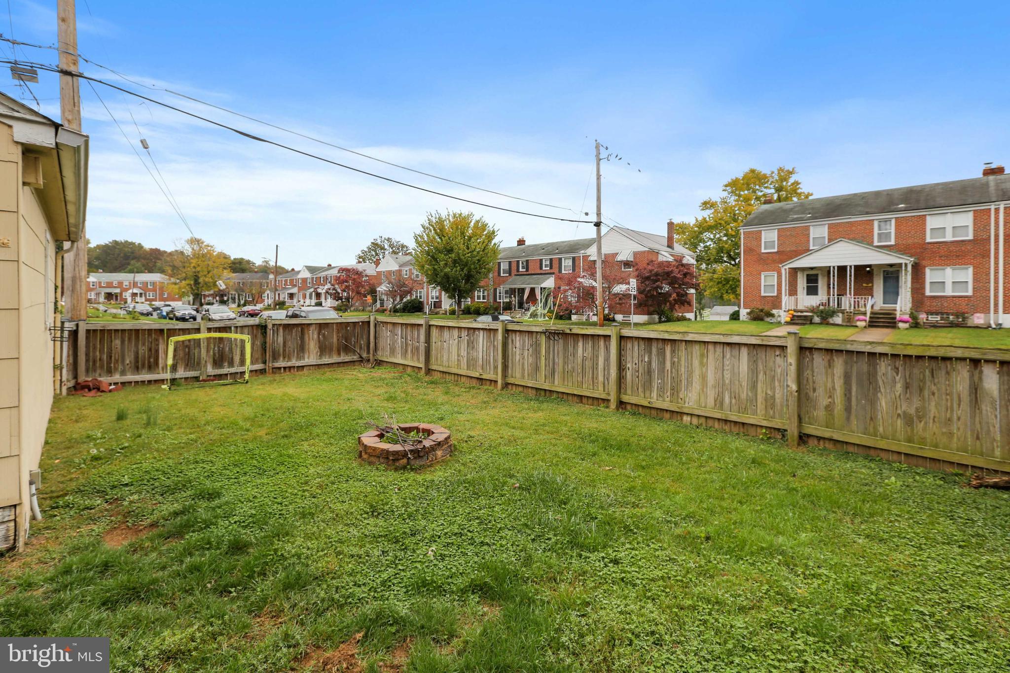 215 Cherrydell Road Catonsville, MD 21228 - Photo 19 of 20 a view of a garden with a building in the background