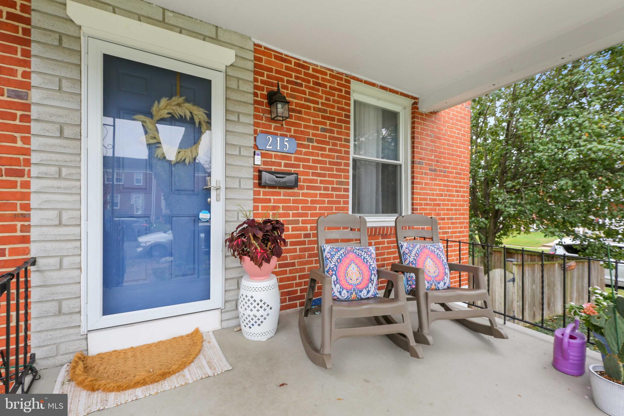 215 Cherrydell Road Catonsville, MD 21228 - Photo 3 of 20 a view of a chairs in front of house