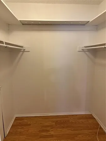 a view of an empty walk in closet