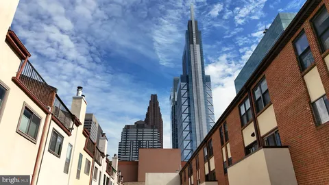 an outdoor space with lots of furniture and garden view