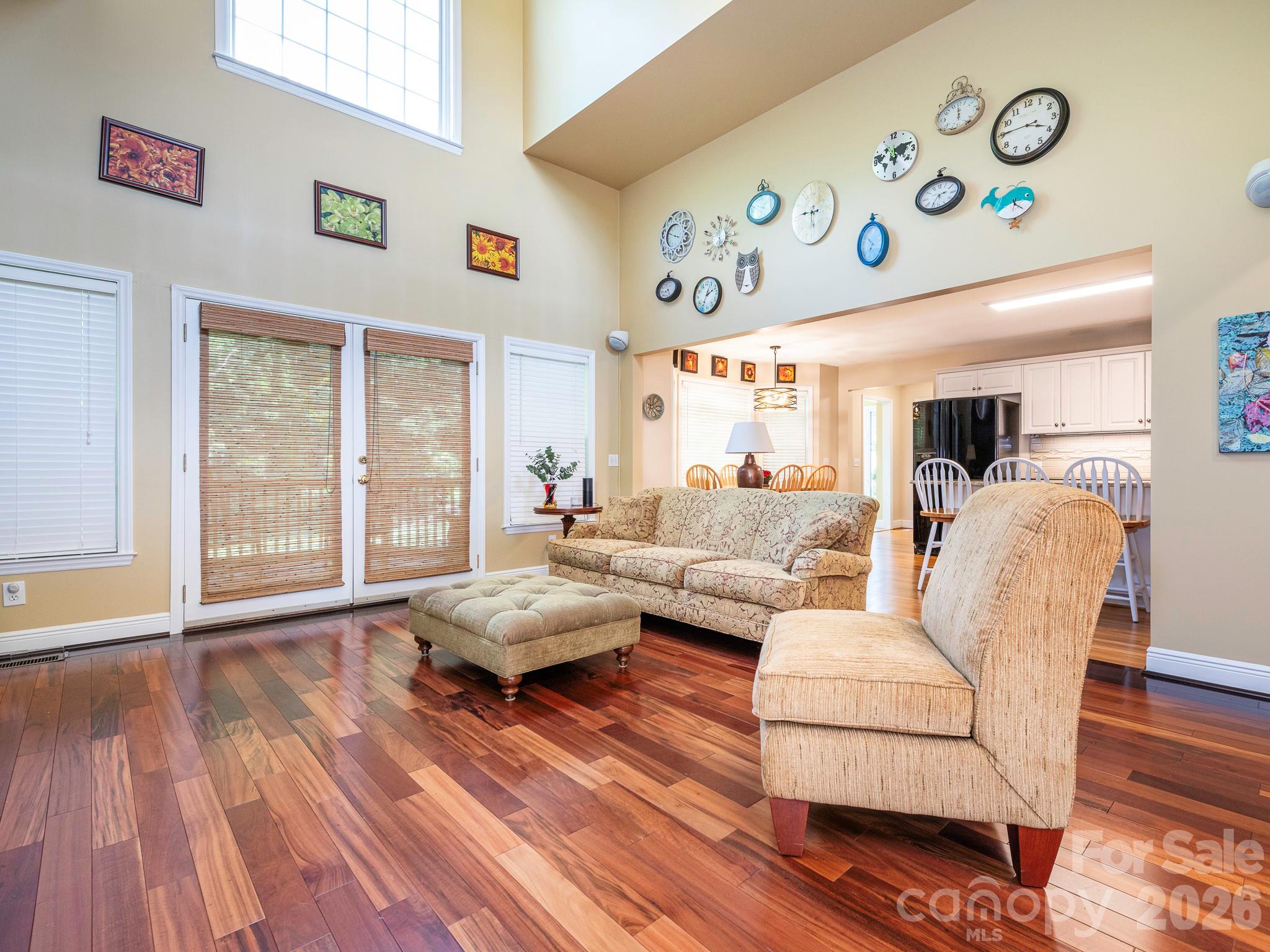 4440 Hucks Road Charlotte, NC 28269 - Photo 7 of 45 a living room with furniture and wooden floor