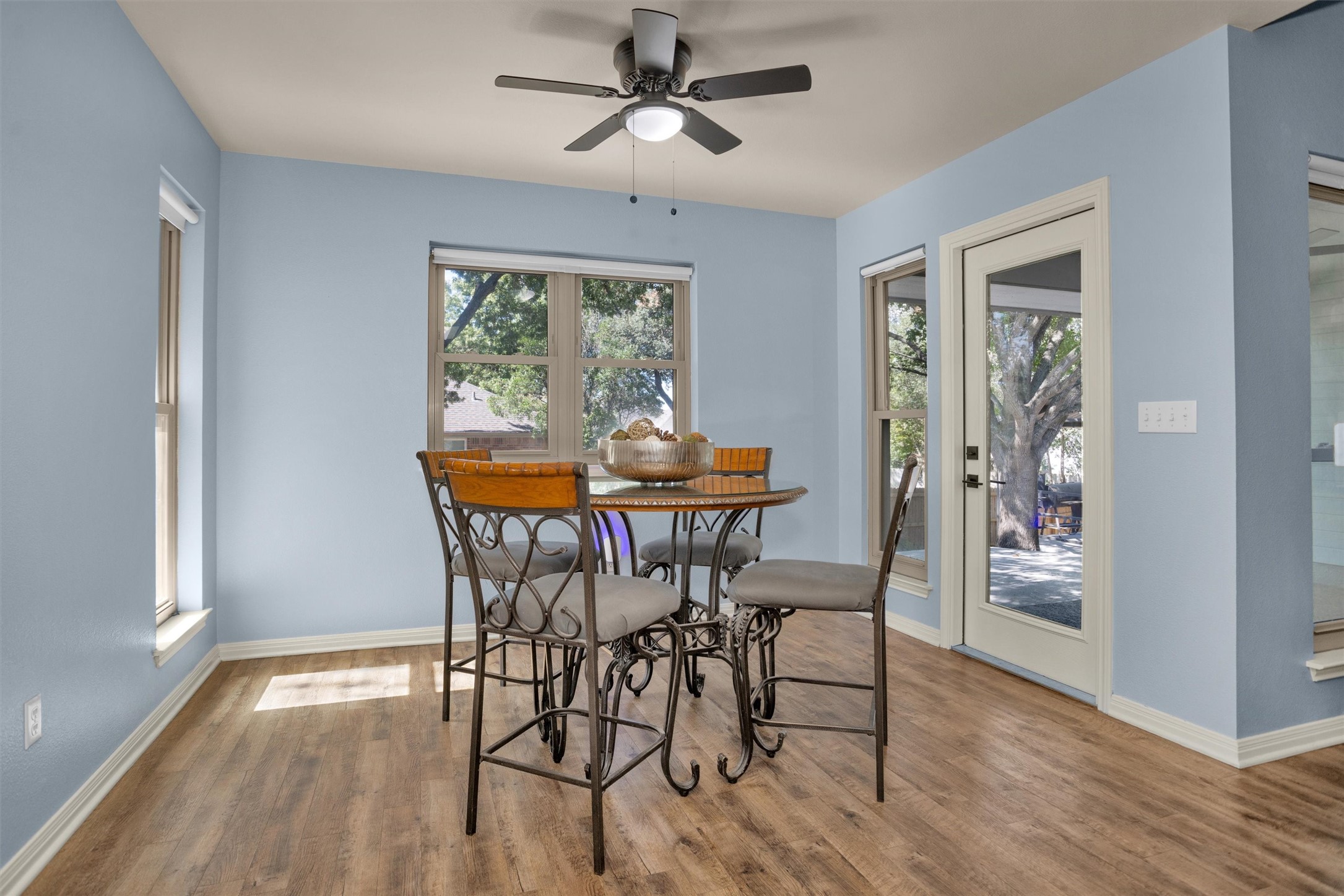 1906 Round Table New Braunfels, TX 78130 - Photo 12 of 46 a dining room with furniture a chandelier and wooden floor