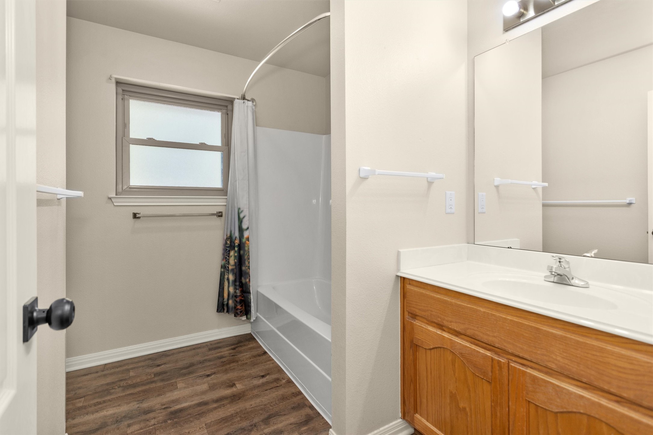 1906 Round Table New Braunfels, TX 78130 - Photo 26 of 46 a bathroom with a sink and a mirror