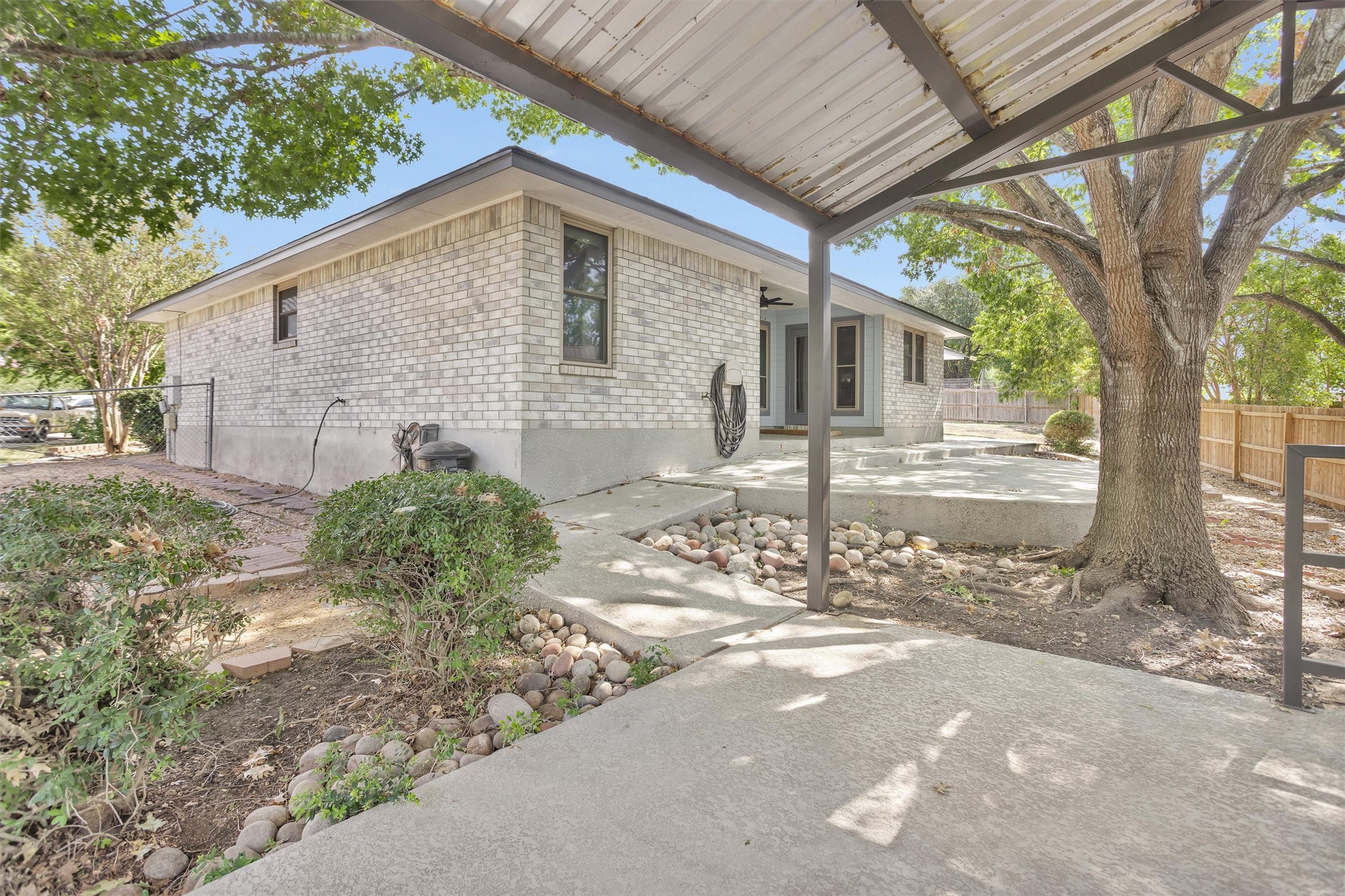1906 Round Table New Braunfels, TX 78130 - Photo 37 of 46 a front view of a house with garden