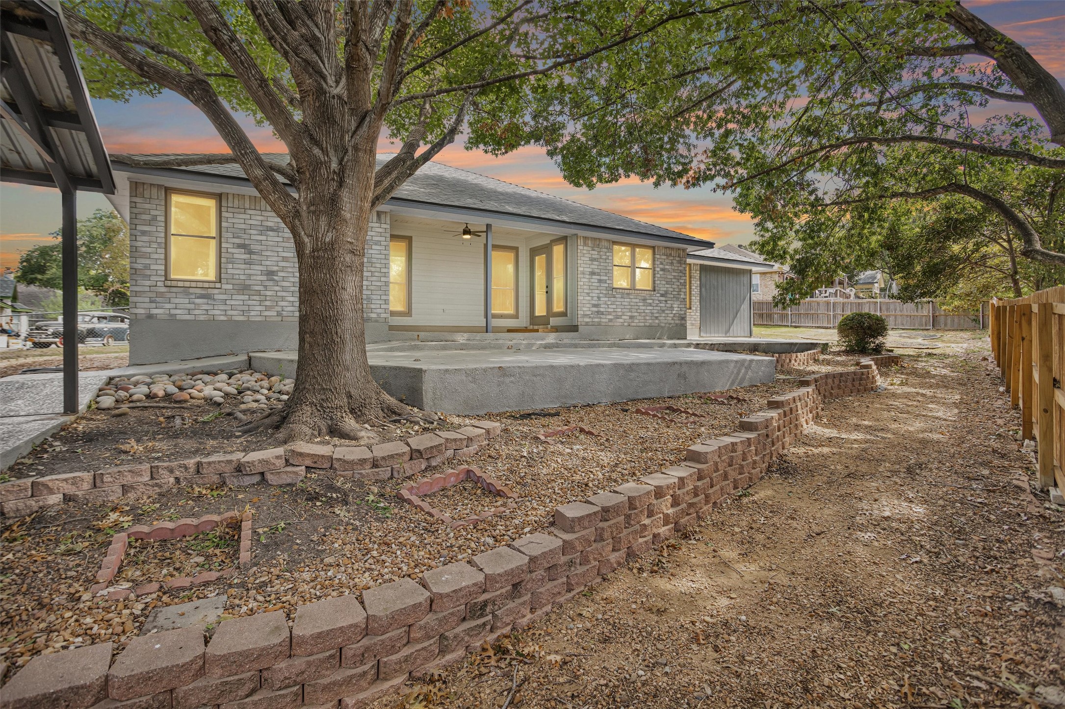 1906 Round Table New Braunfels, TX 78130 - Photo 42 of 46 a view of a yard with a house and a large tree