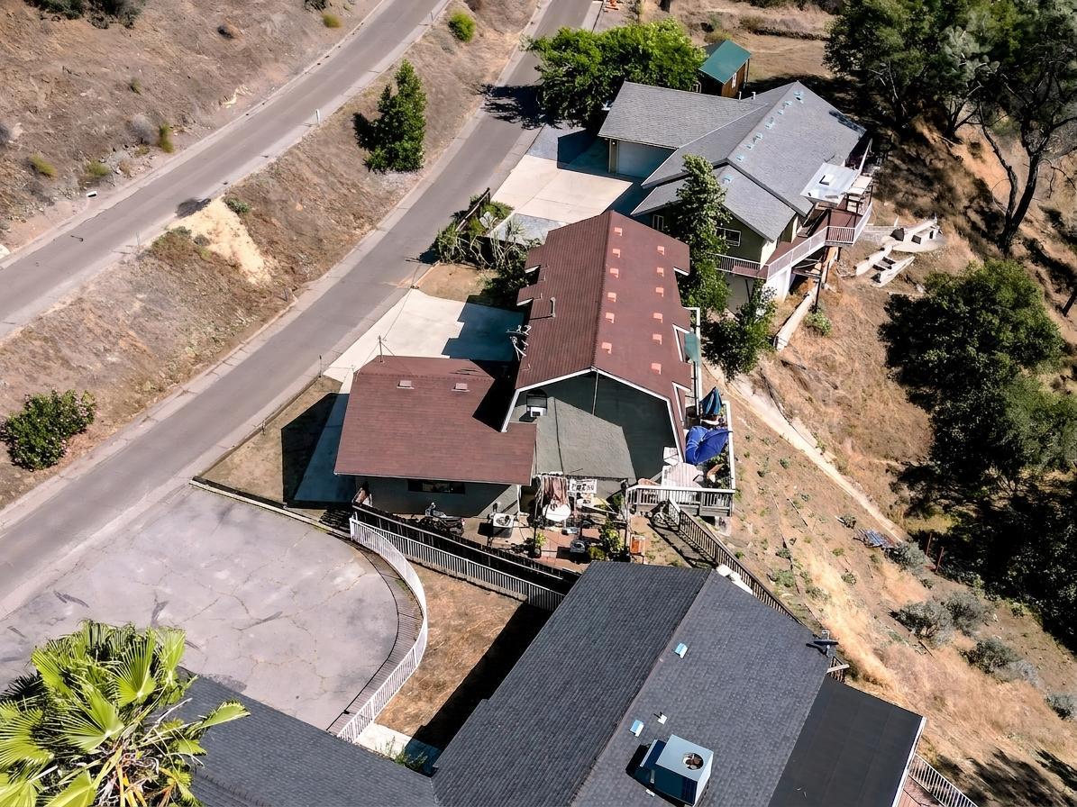 27817 Sky Harbour Road Friant, CA 93626 - Photo 30 of 36 an aerial view of a house with a yard