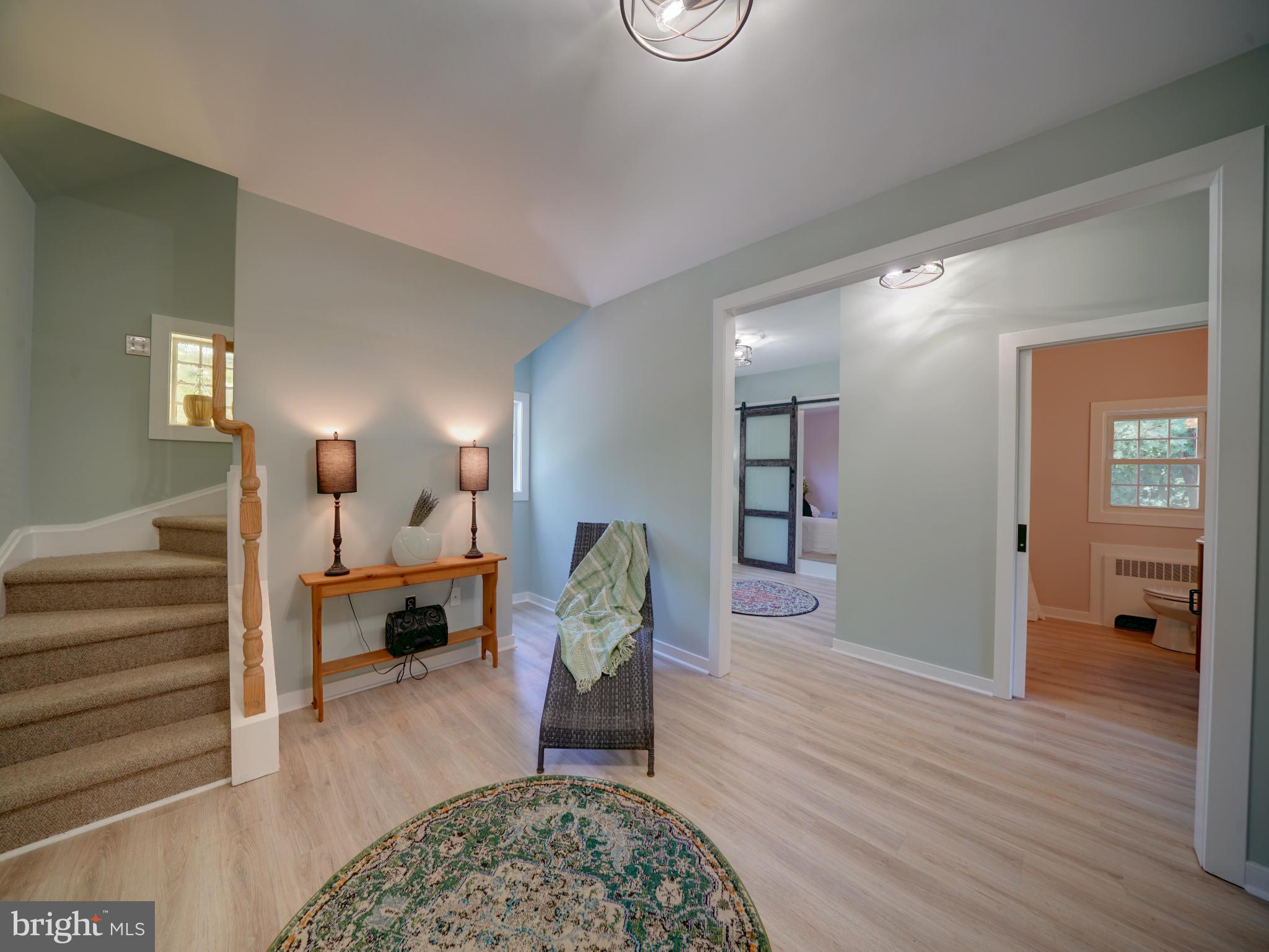 309 Gun Road Baltimore, MD 21227 - Photo 12 of 99 Guest House Great Room with Modern Design