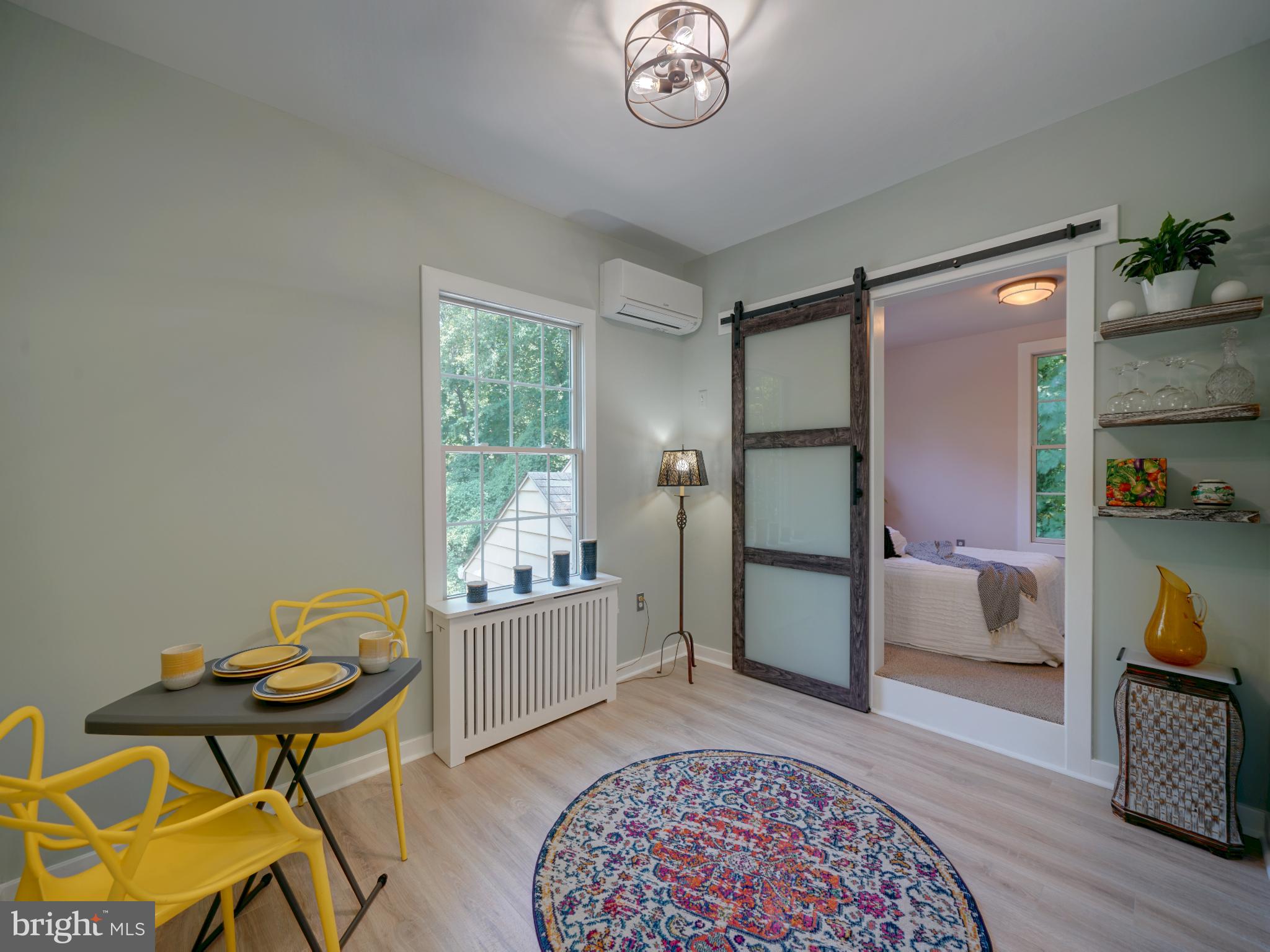 309 Gun Road Baltimore, MD 21227 - Photo 13 of 99 Guest House Dining with Barn Door to Bedroom