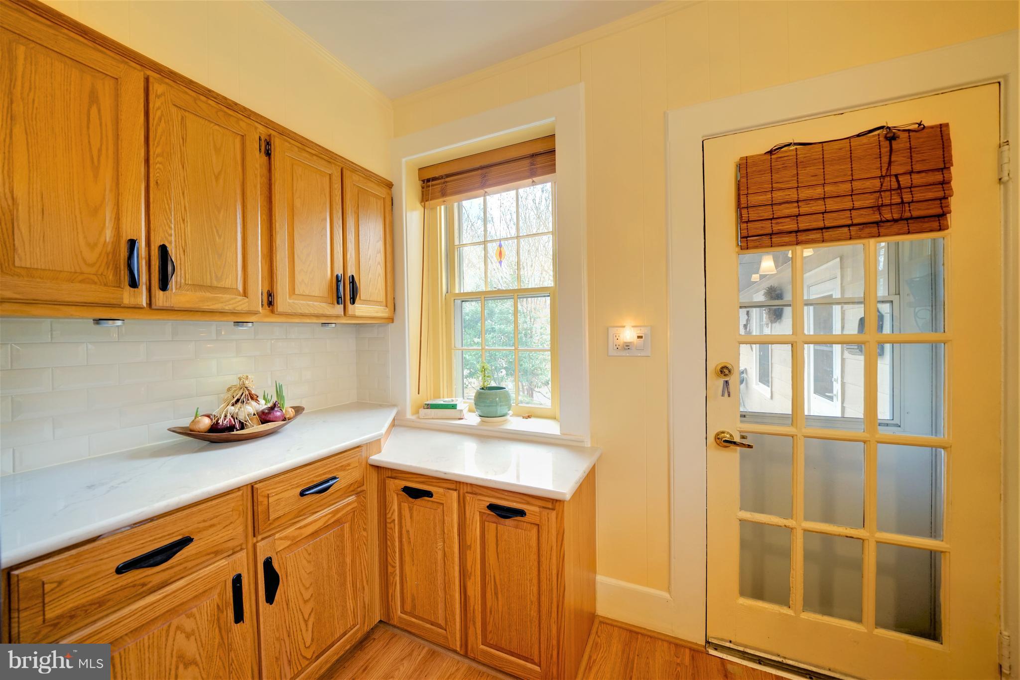 309 Gun Road Baltimore, MD 21227 - Photo 24 of 99 Kitchen with Original Wood Door to Guest House