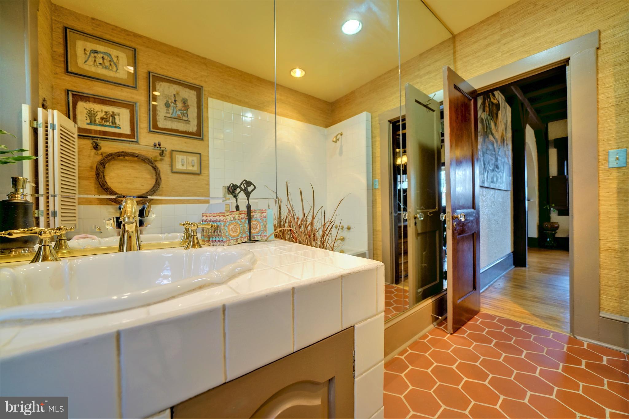 309 Gun Road Baltimore, MD 21227 - Photo 38 of 99 Porcelain Sink & Terra Cotta Tile on Main Level