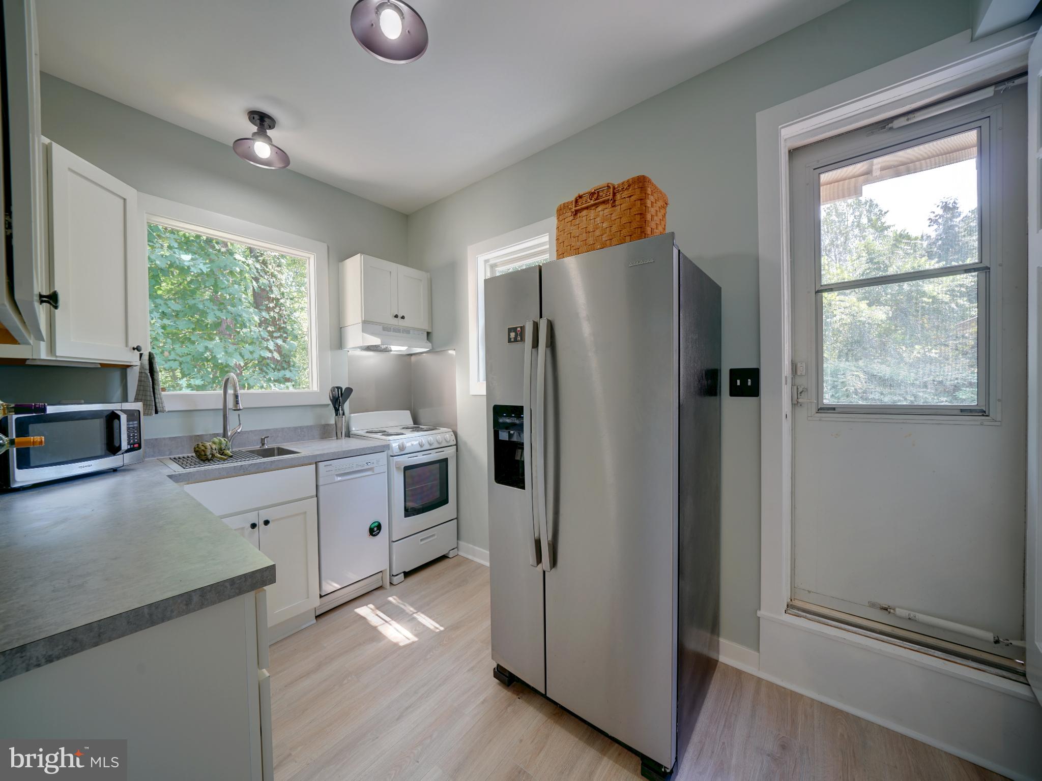 309 Gun Road Baltimore, MD 21227 - Photo 77 of 99 Guest House Kitchen with Door to Terrazzo