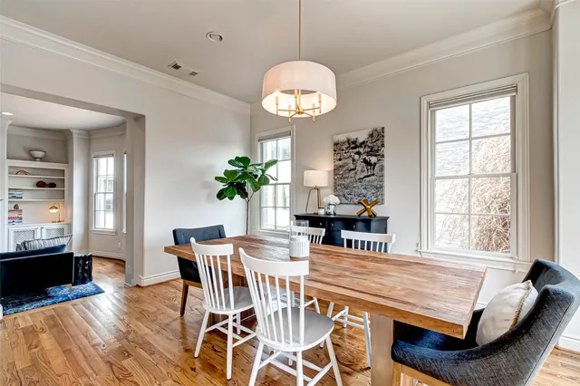 a room with furniture and wooden floor
