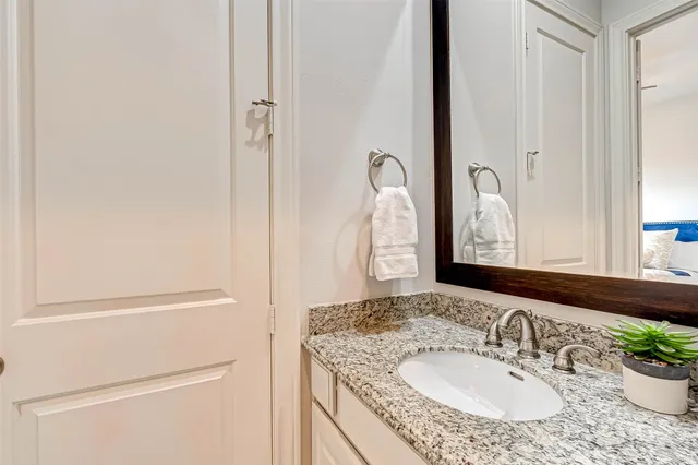 a view of a brick building with many windows