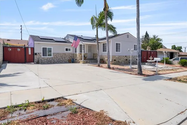 a front view of a building with garden