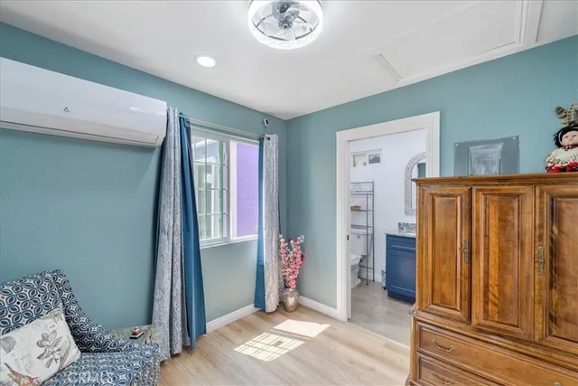 a view of entryway with wooden floor