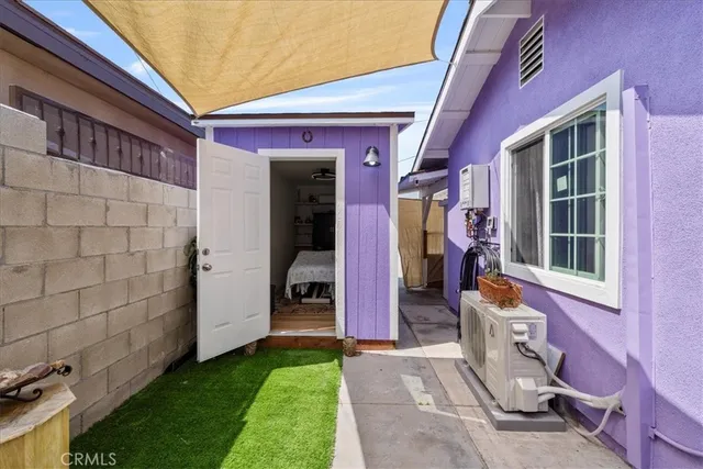 a view of a hallway with a white walls