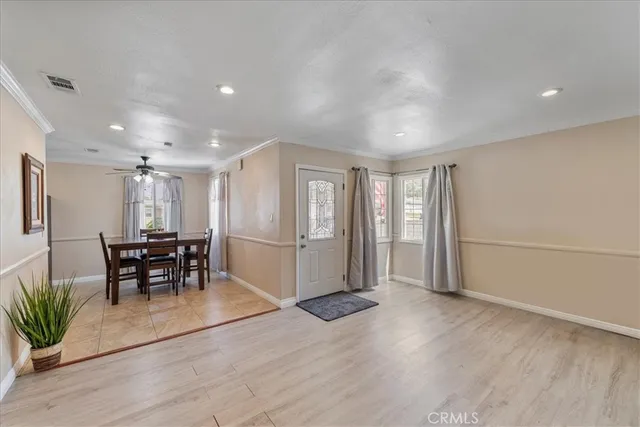 a view of dining room with furniture and wooden floor