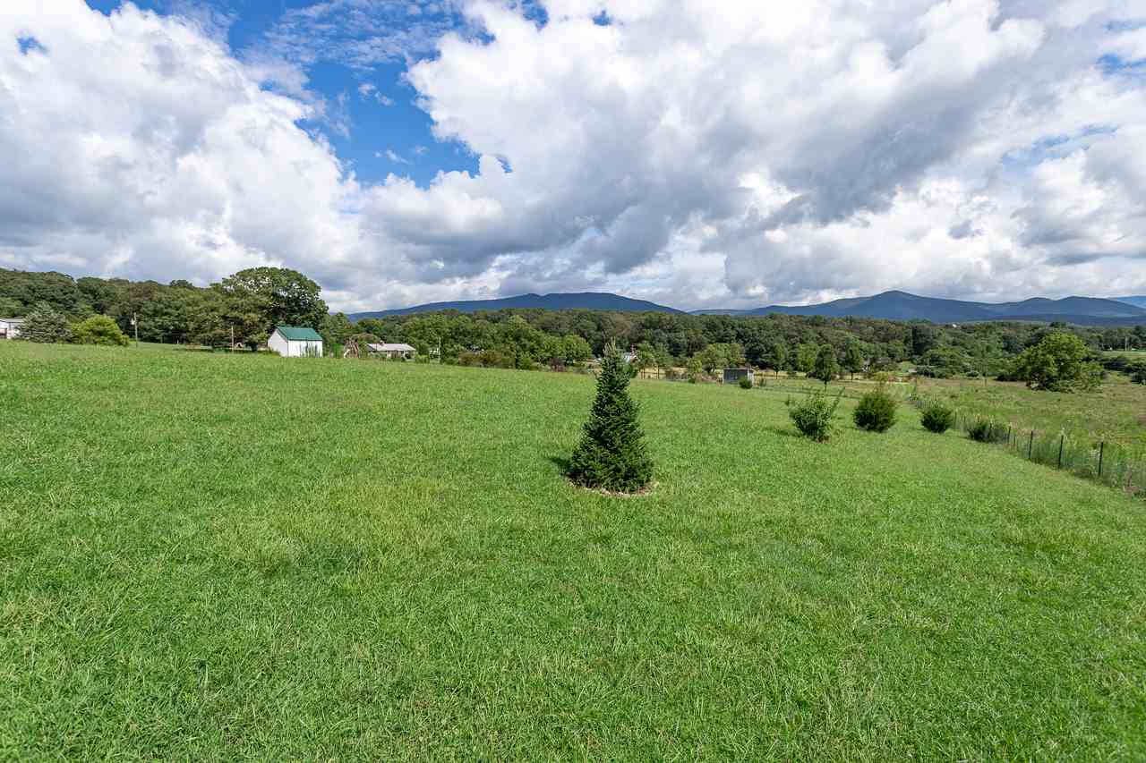 0 Cavalier Road Rileyville, VA 22650 - Photo 15 of 16 a view of a lake with a yard