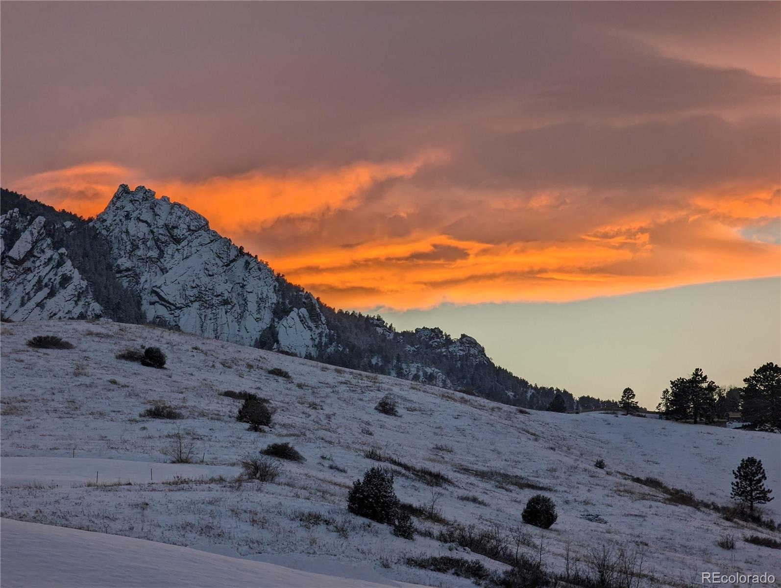 205 Fair Place Boulder, CO 80302 - Photo 16 of 46 a view of a beach with a mountain in the background