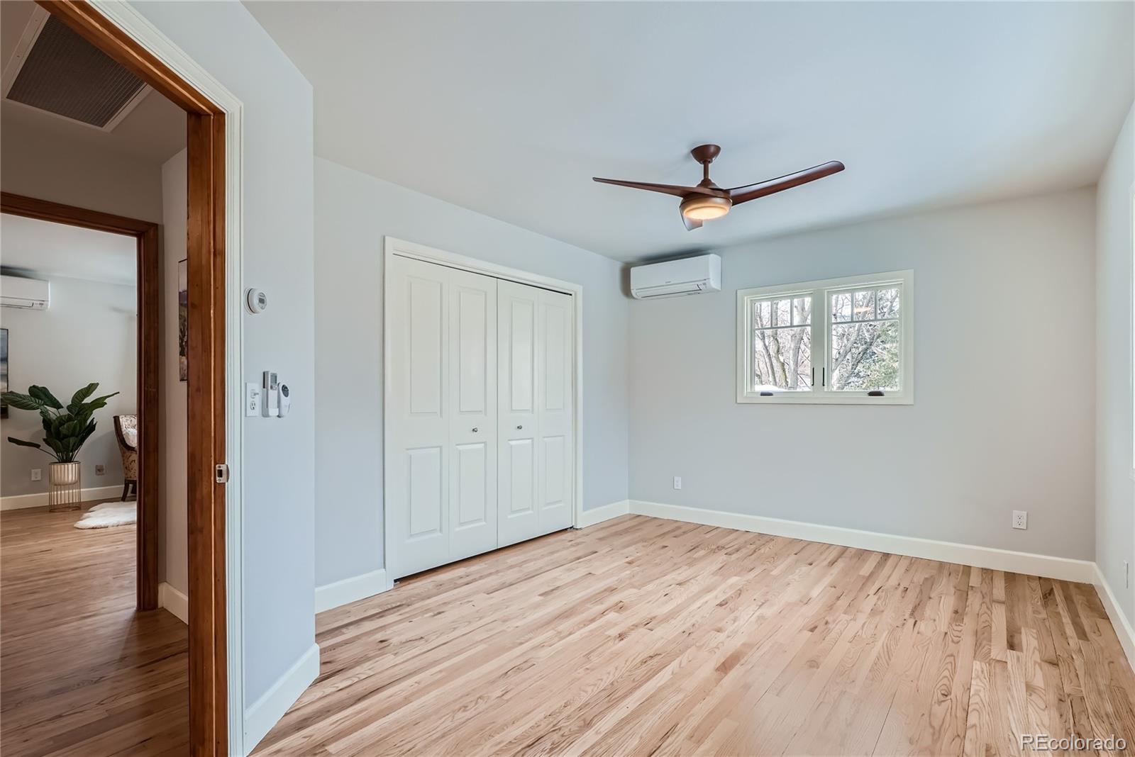 205 Fair Place Boulder, CO 80302 - Photo 25 of 46 wooden floor in an empty room with a window
