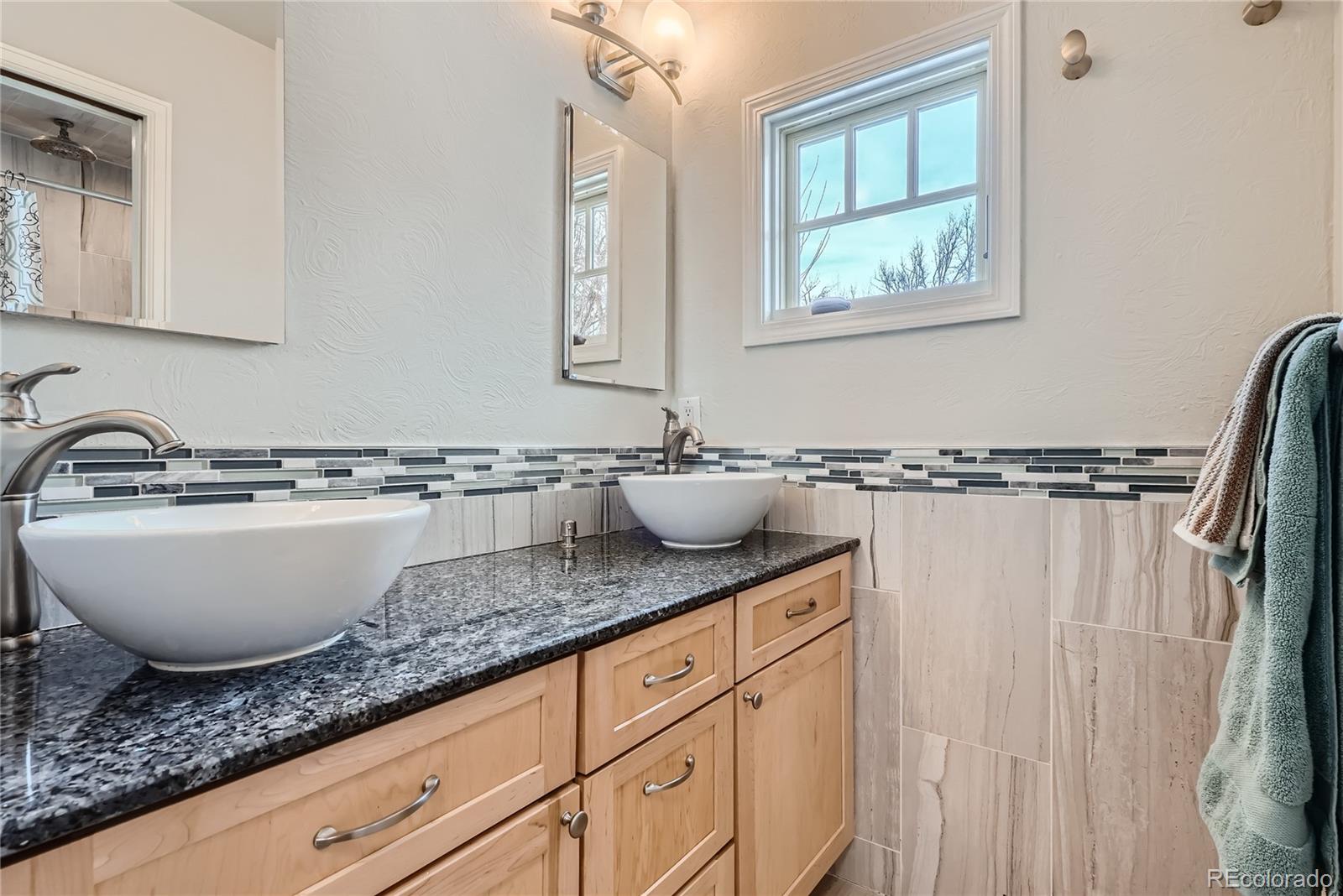 205 Fair Place Boulder, CO 80302 - Photo 27 of 46 a close view of sink and mirror