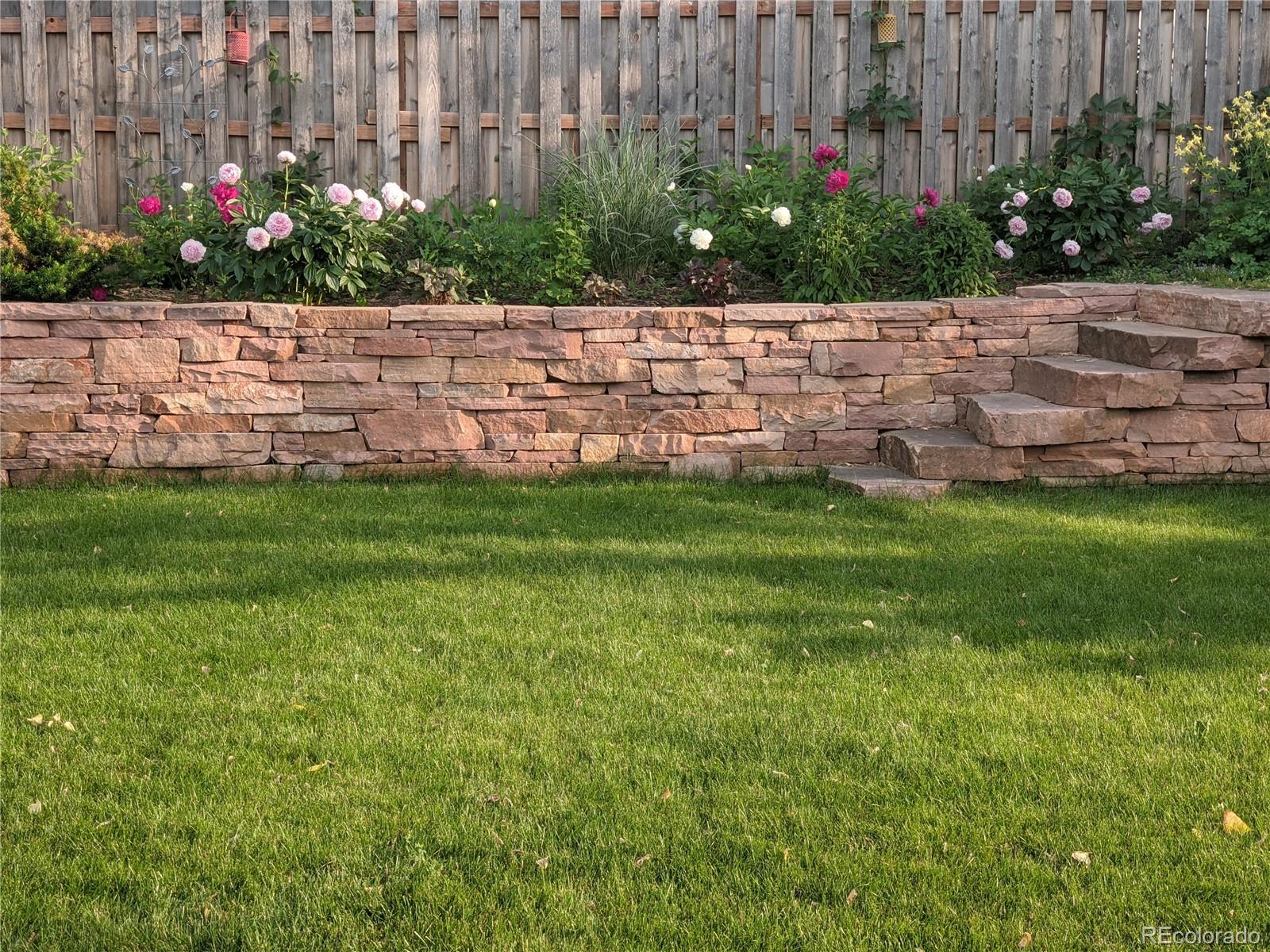 205 Fair Place Boulder, CO 80302 - Photo 32 of 46 a view of garden with flowers and trees