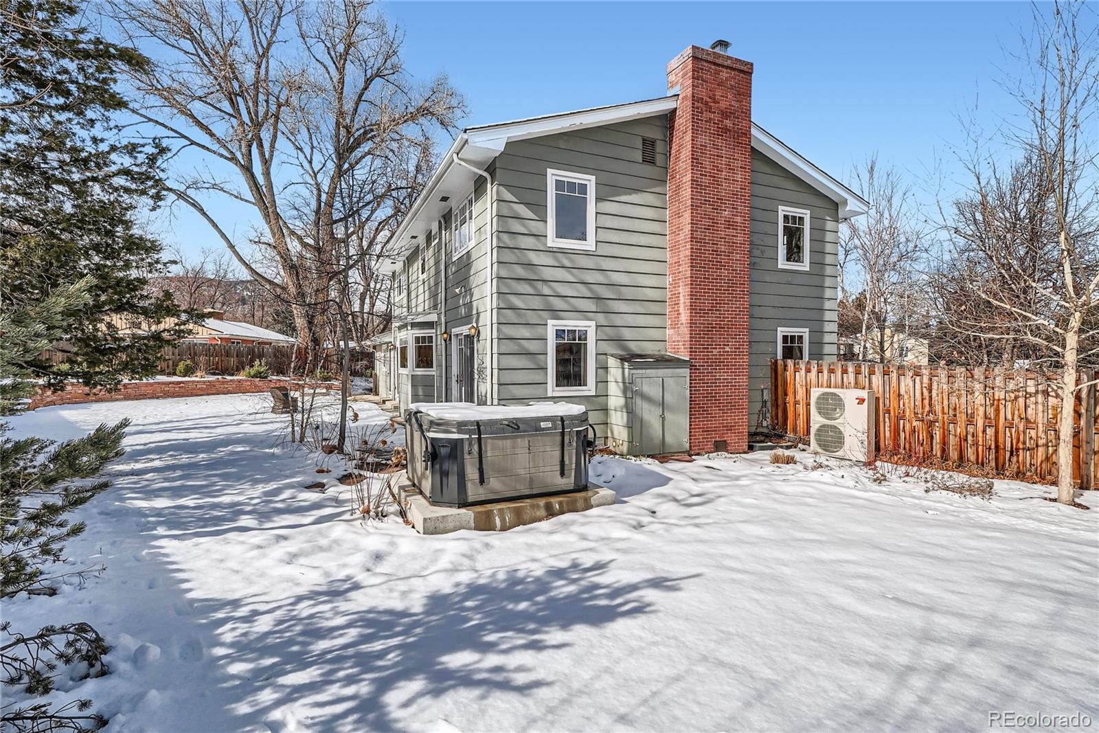 205 Fair Place Boulder, CO 80302 - Photo 38 of 46 a front view of a house with a yard