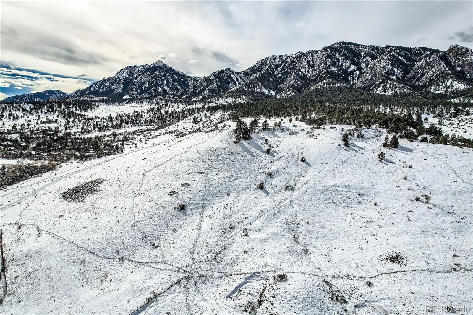 205 Fair Place Boulder, CO 80302 - Photo 42 of 46 a view of a beach with a snow in the back